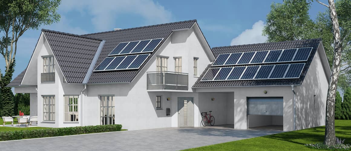 White ranch-style house with solar panels, showcasing a ranch-style home with solar energy installations.