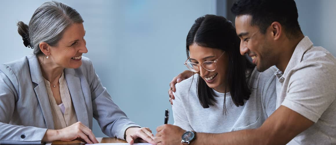 RHB Assets From IGX: Young couple talking to a consultant