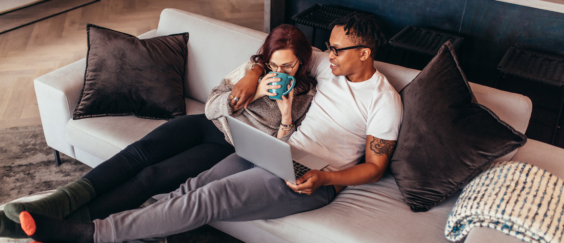 Stock-Couple-Relaxing-Sofa.jpg