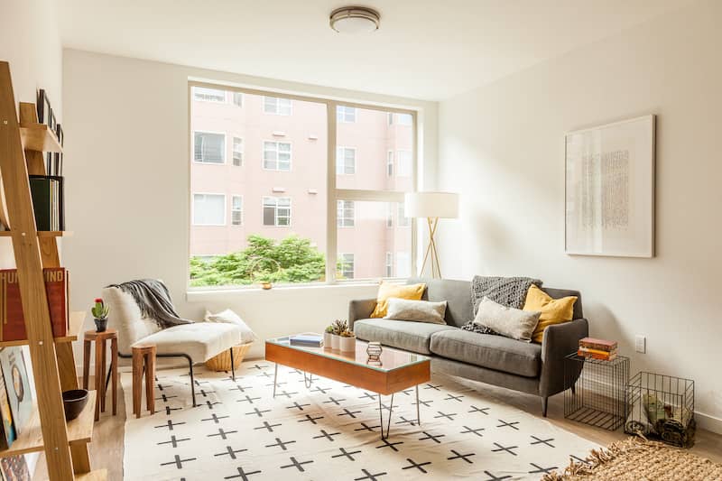 Interior view of a bright, clean, apartment living room.