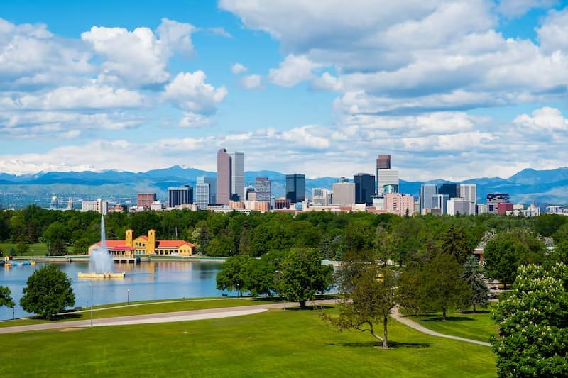 Greenspace with Denver skyline in background