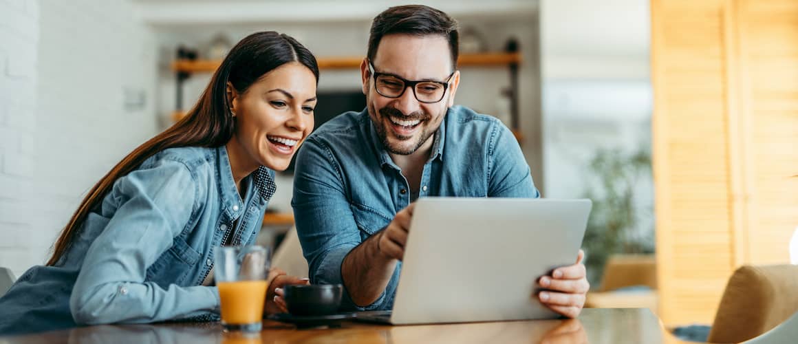 Real estate agent assisting senior man with home purchase