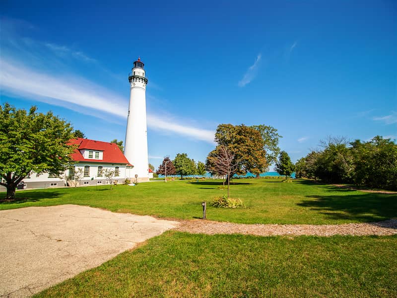 RHB Assets From IGX: Wind Point Lighthouse in Racine, Wisconsin, surrounded by greenery