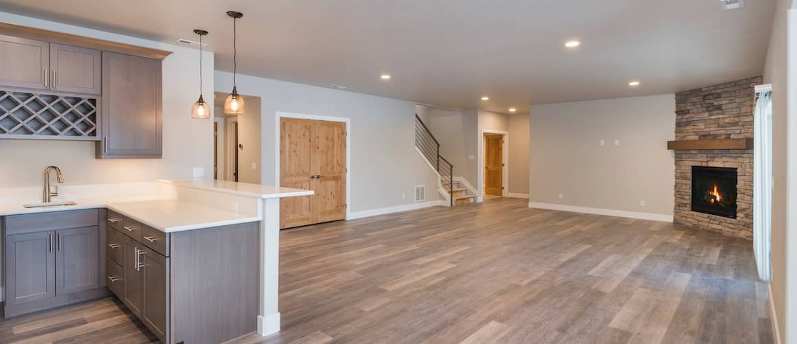 Finished basement with wet bar and fireplace.