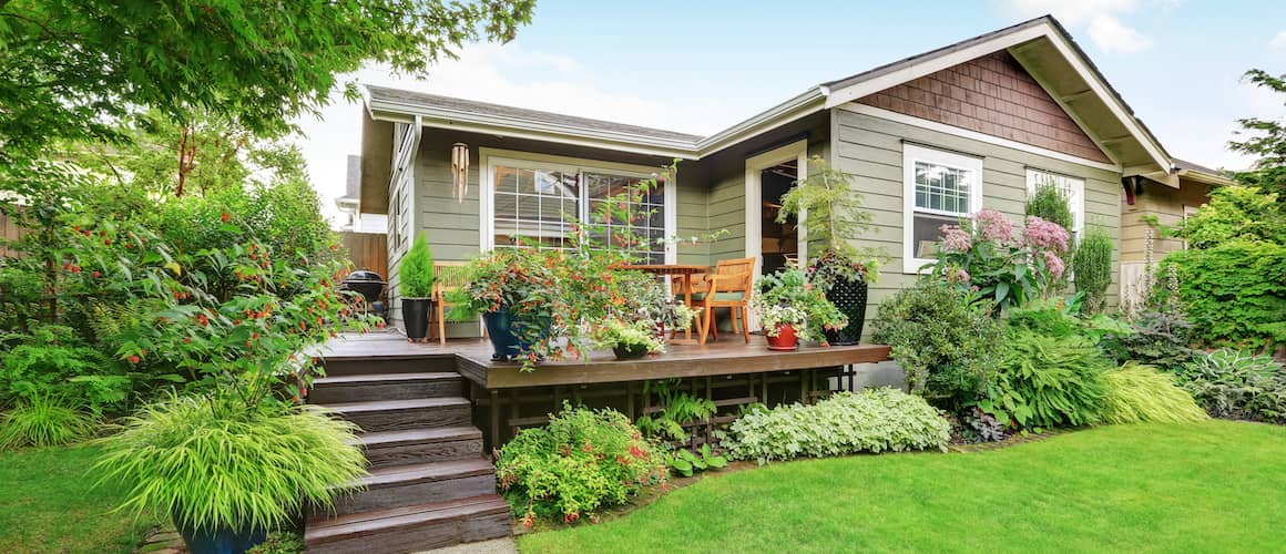 A backyard area featuring a well-maintained garden.