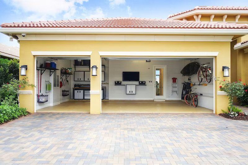 Southwest style garage with organized storage inside along walls. 