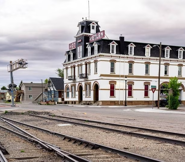 Railroad tracks in front of historic building in Dillon, Montana.