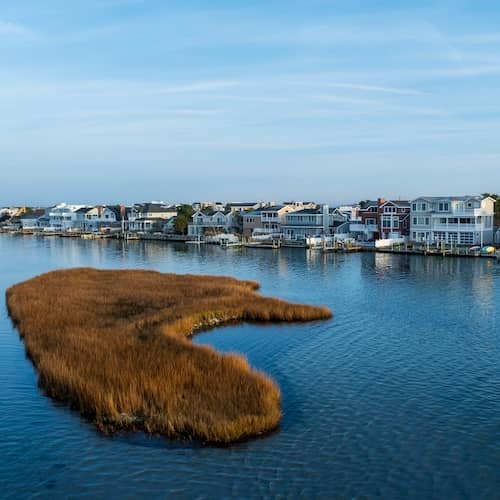 Homes along Surf City, New Jersey on a calm, clear day.
