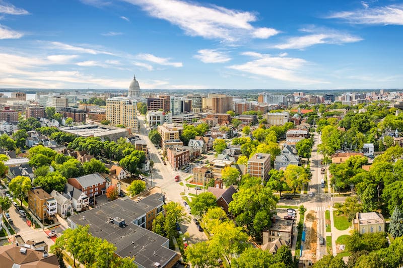 RHB Assets From IGX: Stunning aerial view of Madison, Wisconsin, showcasing the city and lakes.