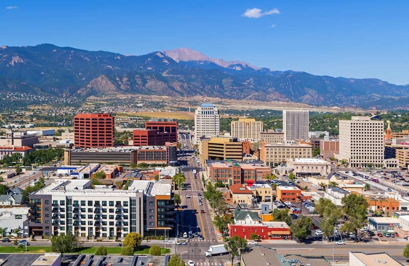 A view of Pikes Peak and downtown Colorado Springs, Colorado on a sunny day.