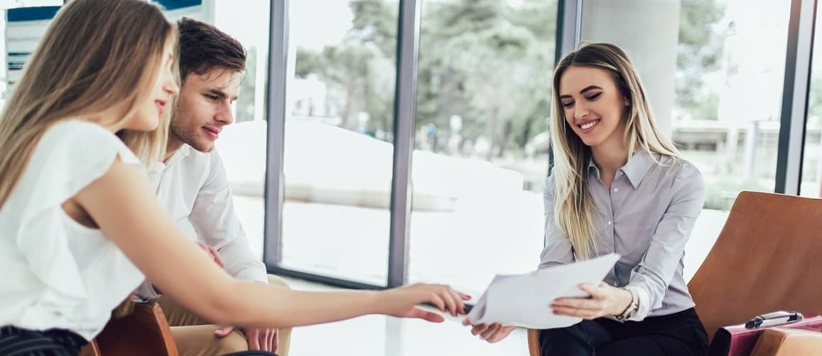 RHB Assets From IGX: Couple talking to a realtor