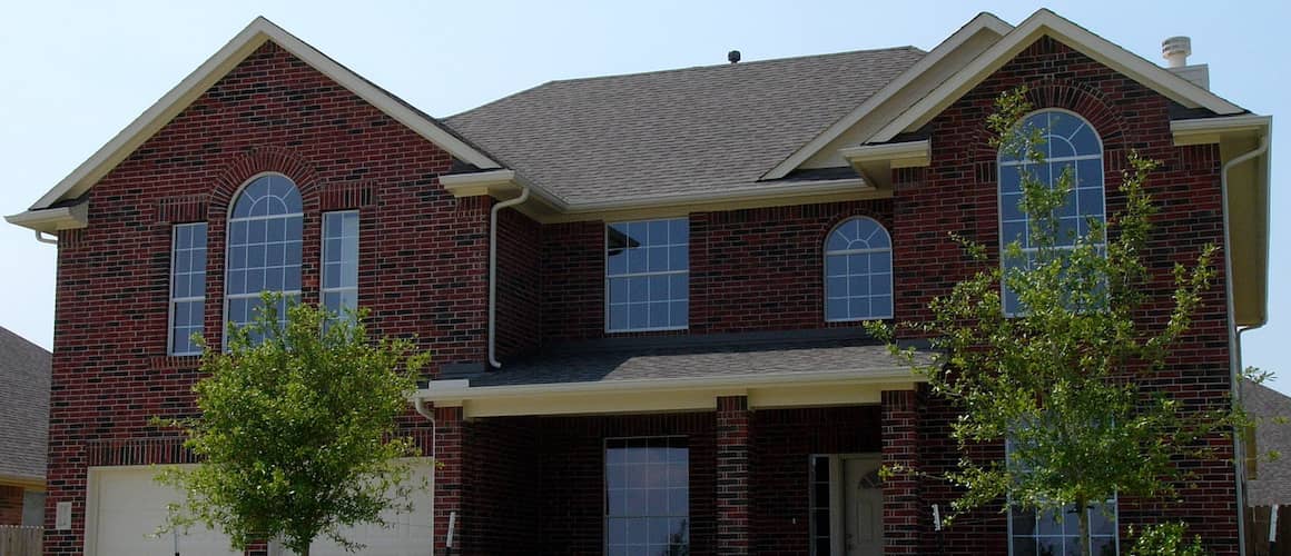 A brick home in Texas, depicting a traditional residential property in a specific location.