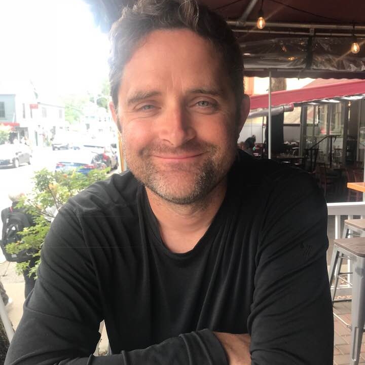 Headshot of Carey Chesney, contributing writer for Rocket.