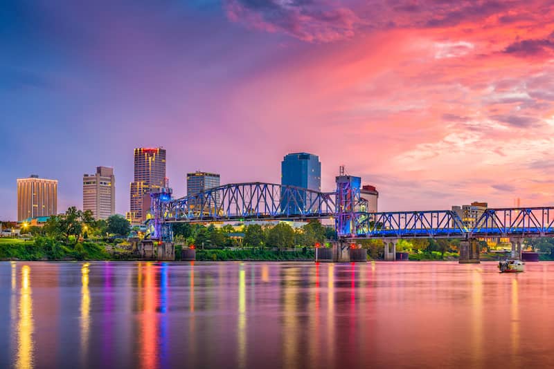 RHB Assets From IGX: Colorful skyline of Little Rock, Arkansas, with a reflection on the river.