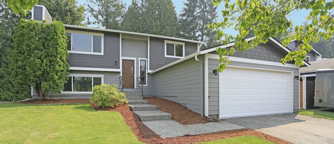 Stock-Two-Story-Grey-With-Extended-Garage-AdobeStock183467276 copy.jpg