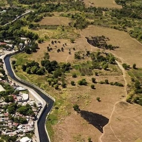 A large section of undeveloped land, potentially discussing land investments or development opportunities.