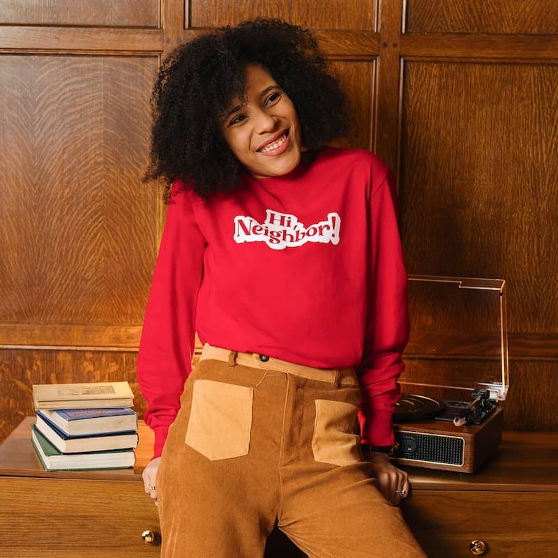 Yariani Sosa leaning against a table.