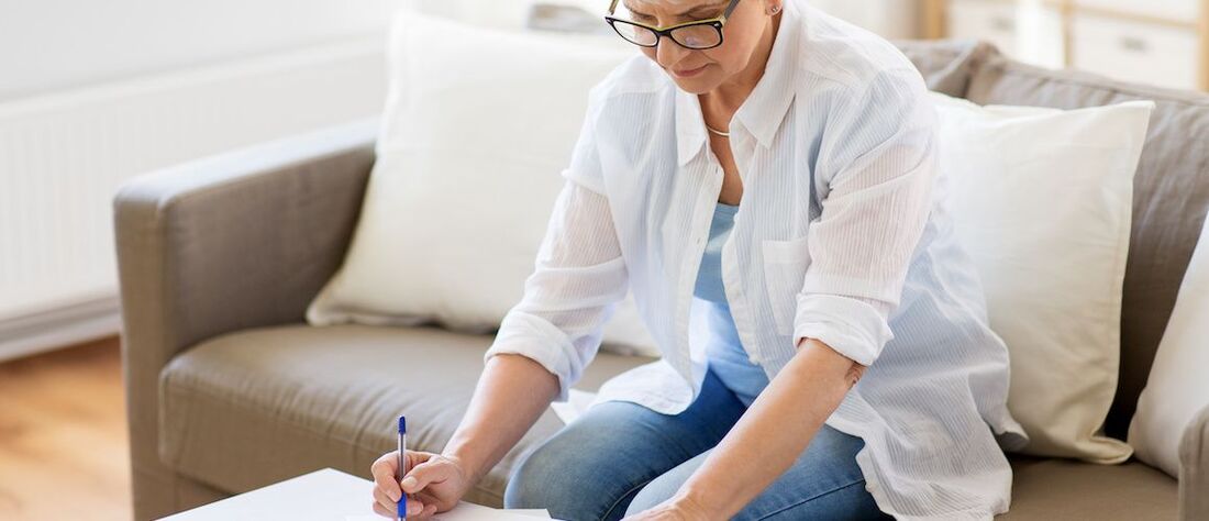 Woman-Doing-Finances-At-Home-compressor.jpeg