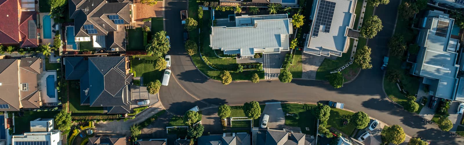 RHB Assets From IGX: Top-down view of a suburban neighborhood with houses and trees