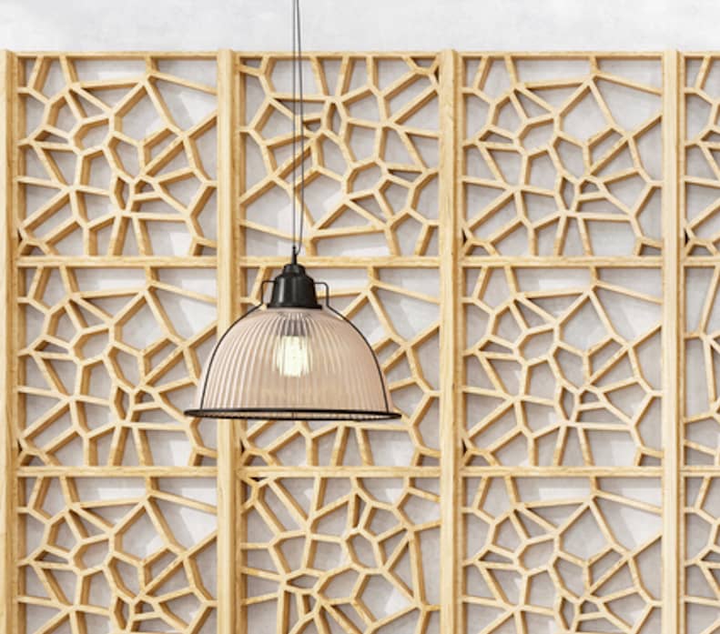 Wood intricate laser cut panels as kitchen backsplash.