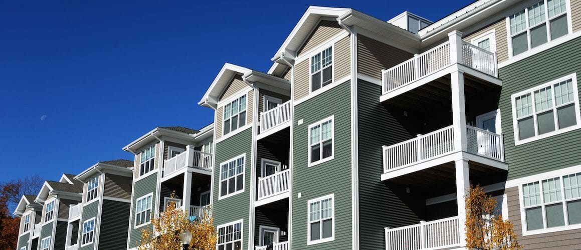 A row of condos, discussing the cost or refinancing options related to condominiums.