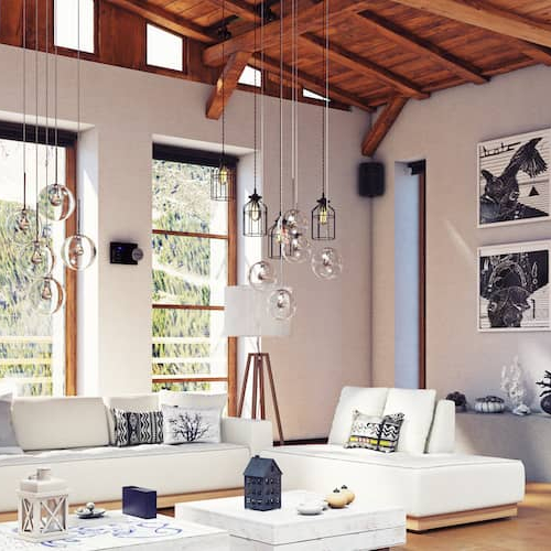 A cozy living room with a fireplace and elegant wood flooring, creating a warm and inviting atmosphere.