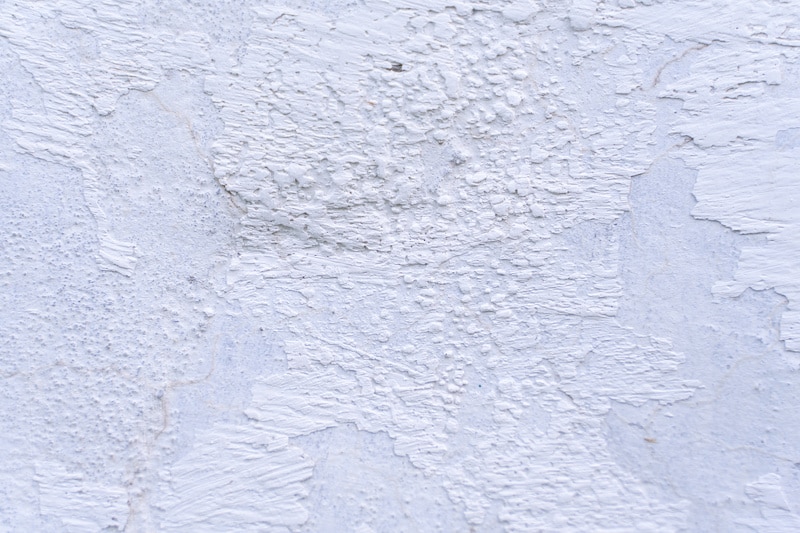 RHB Assets From IGX: Close-up of a textured stucco ceiling in a home.