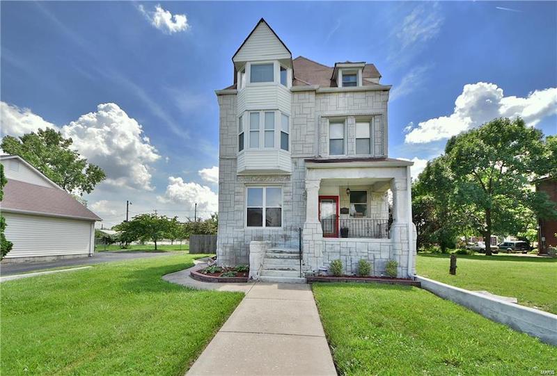 RHB Assets From IGX: St. Louis house with a red brick exterior and charming front porch