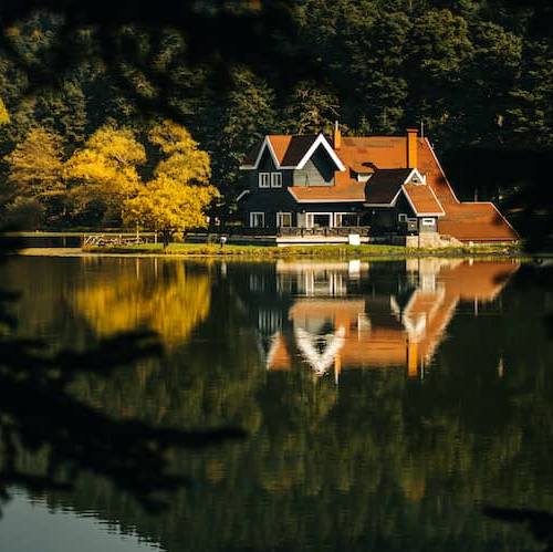 Image representing a house in flood zone, potentially relating to real estate or insurance discussions.