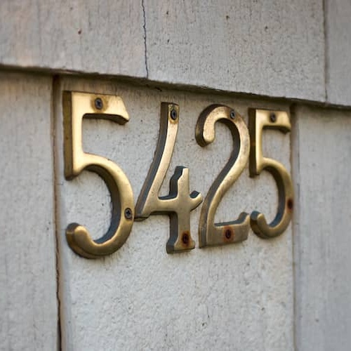 A house with a visible street address.