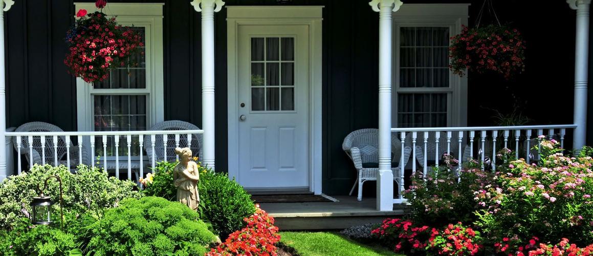 RHB Assets From IGX: Front porch with a white door and potted plants