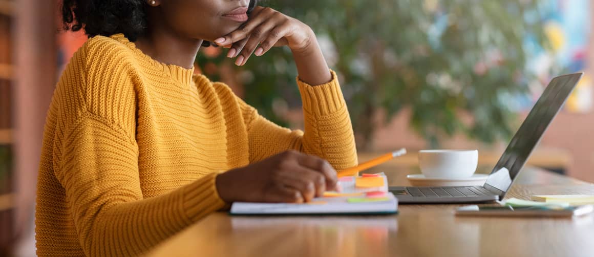 Young woman looking for job online.