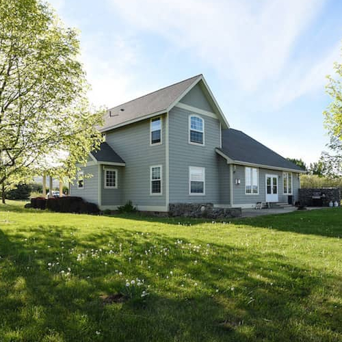 Farmhouse Backyard with Trees