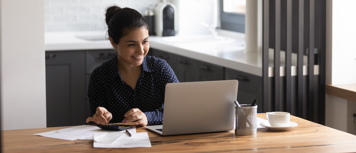 Stock-Woman-Calculating-Savings-AdobeStock-387707888-copy(1).jpeg