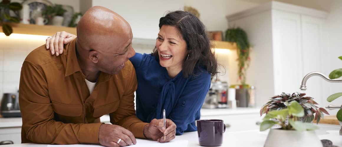 A man and women doing financing or taxes.