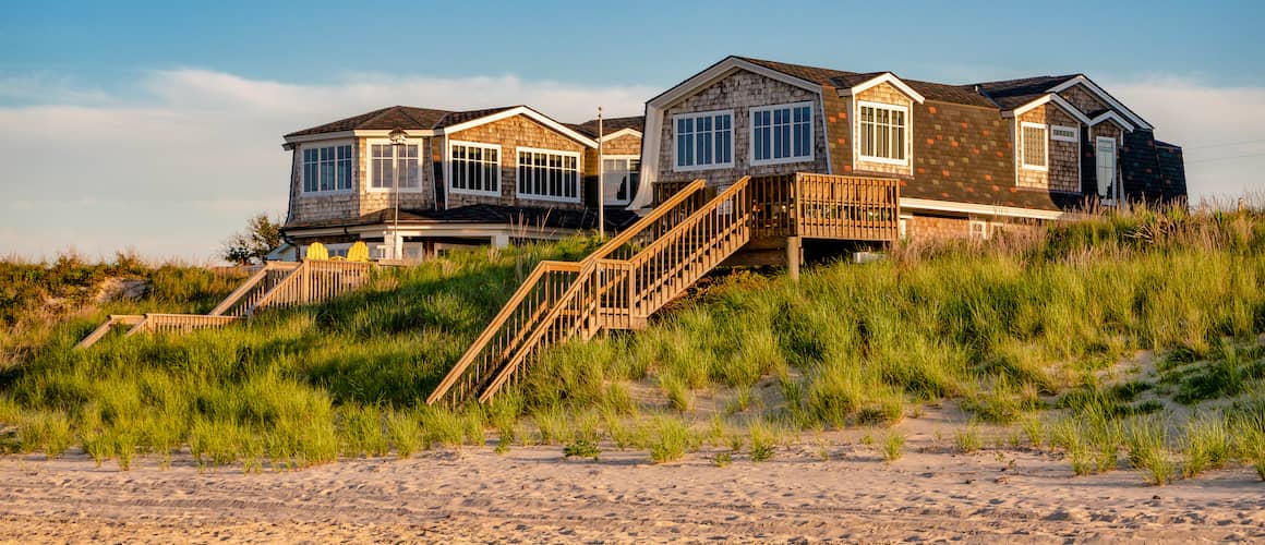 A beach house, symbolizing a coastal living environment or vacation property.