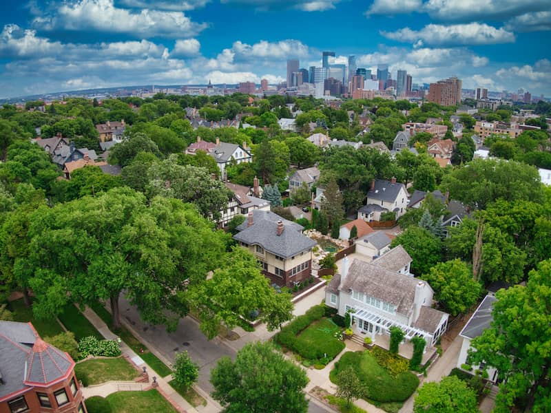 RHB Assets From IGX: Aerial view of downtown Minneapolis with skyscrapers and cityscape.