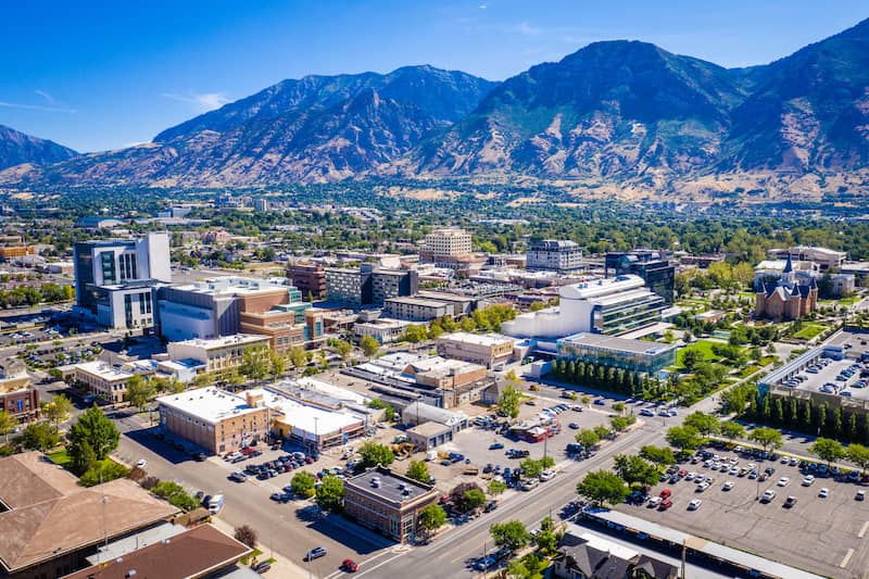 RHB Assets From IGX: A panoramic view of Provo, Utah with mountains in the background.