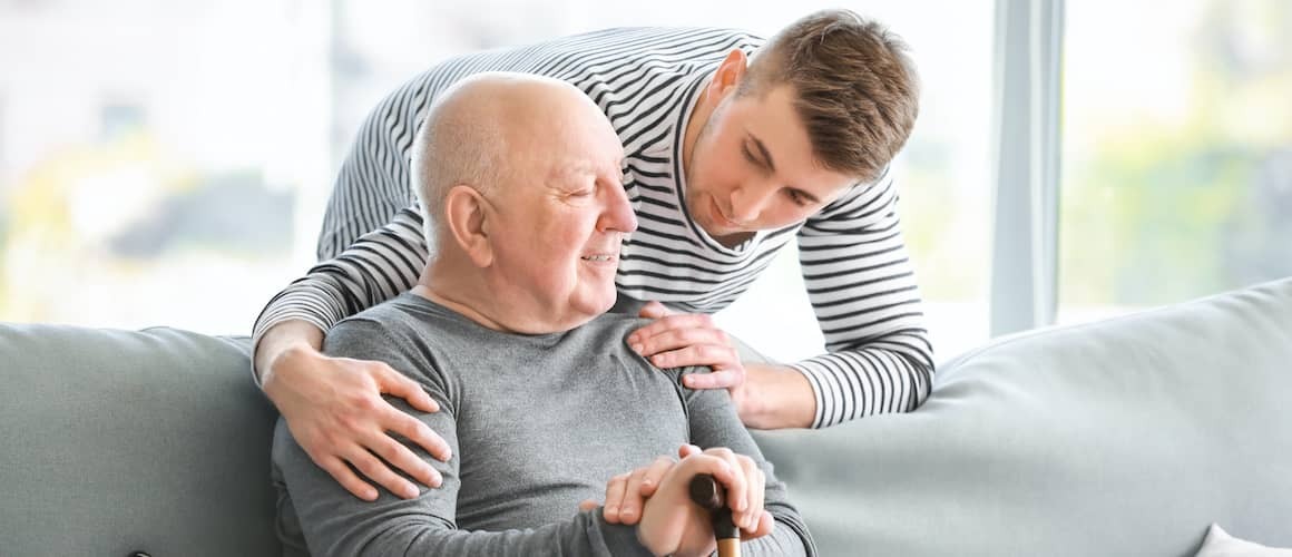 Stock-Male-Caregiver-With-Senior-Man-AdobeStock271899559 copy.jpeg