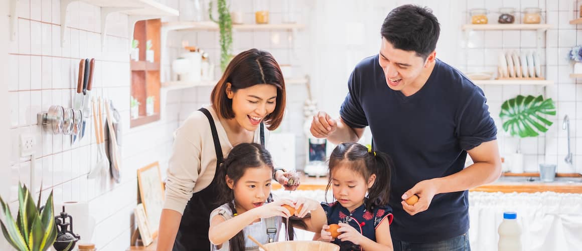Asian American Family In Kitchen