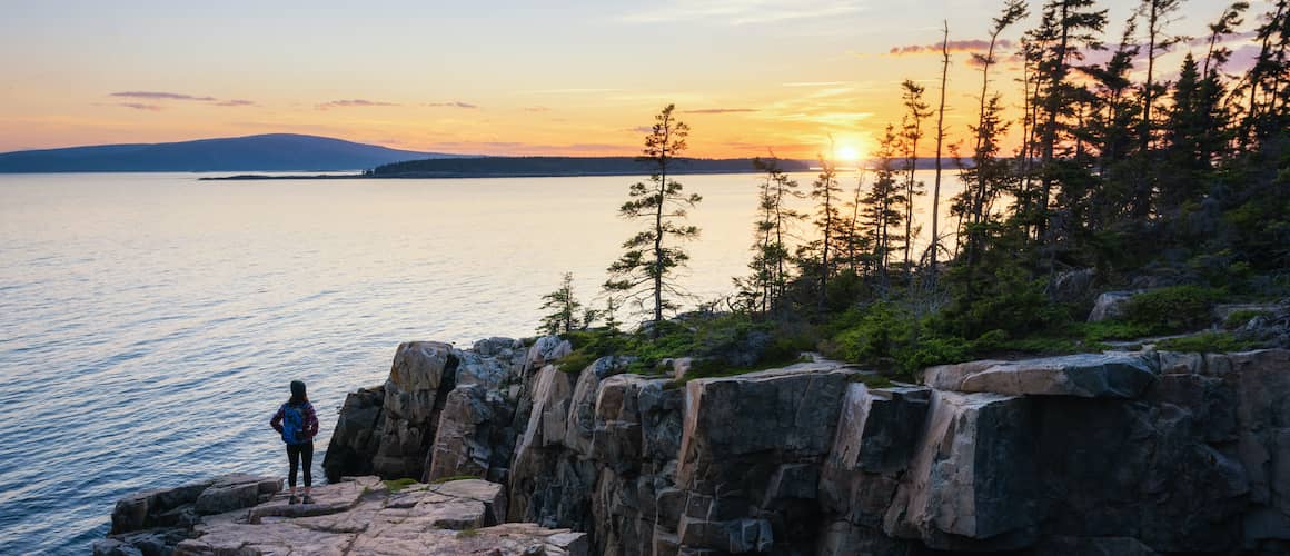 RHB Assets From IGX: Picturesque Maine coast with lighthouse and rocky shoreline