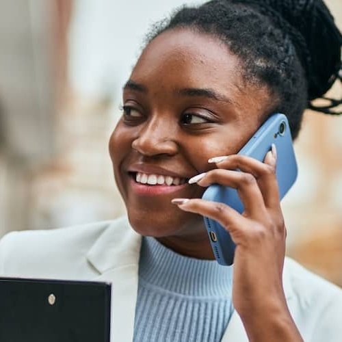 A woman on phone possibly talking to a client or a customer.