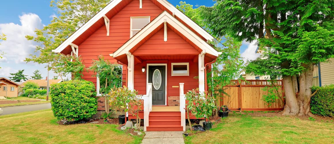 Small red house with white trim.