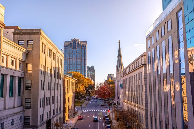 RHB Assets From IGX: Raleigh, North Carolina skyline featuring modern buildings and a blue sky.