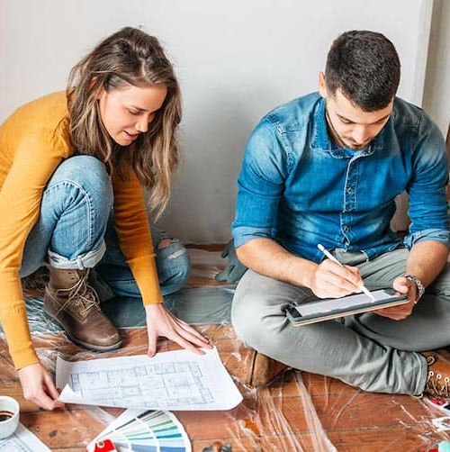 Illustration of a home renovation project with tools, paint, and a blueprint.