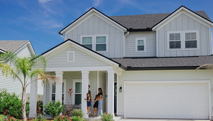 Light grey suburban Florida-style home.